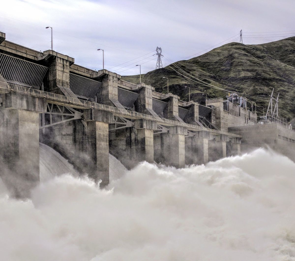 Water roars over a spillway at the Lower Granite Dam.  (Shutterstock)