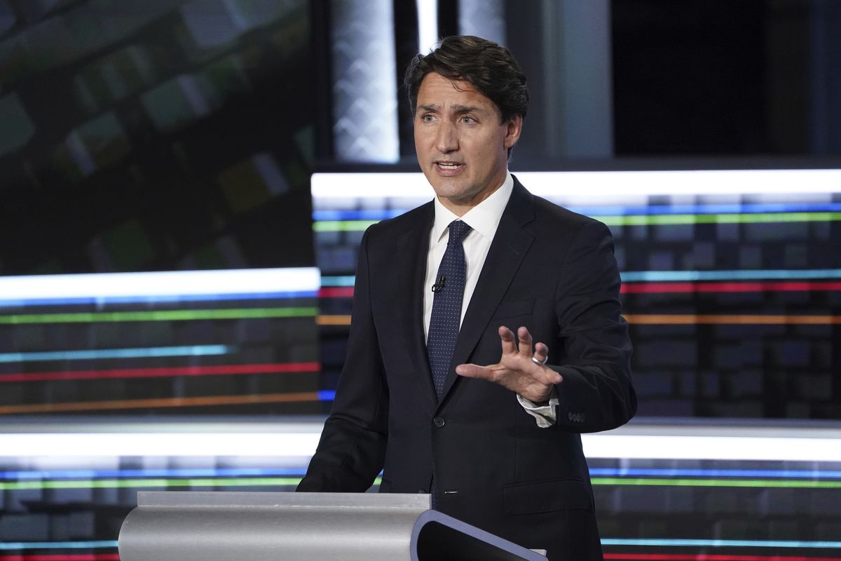 Liberal leader Justin Trudeau makes a point during the federal election French-language leaders debate, Wednesday, Sept. 8, 2021, in Gatineau, Quebec. Trudeau called the early election for Monday, Sept. 20 in hopes of winning a majority of seats in Parliament, but has faced criticism for calling a vote during a pandemic in order to cement his hold on power.  (Sean Kilpatrick)