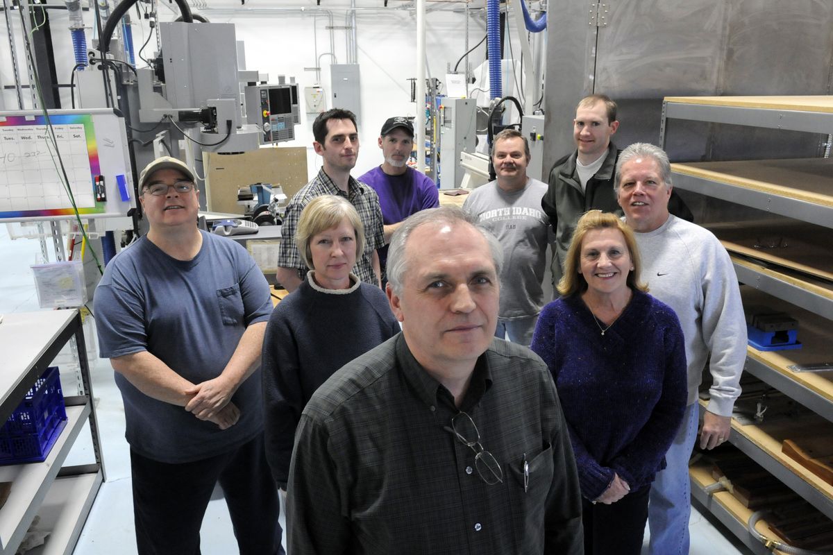 Dan Jorgenson and his crew at Advanced Thermoplastic Composites in the Spokane Valley produce composite brackets for the new Boeing Dreamliner. (J. BART RAYNIAK)