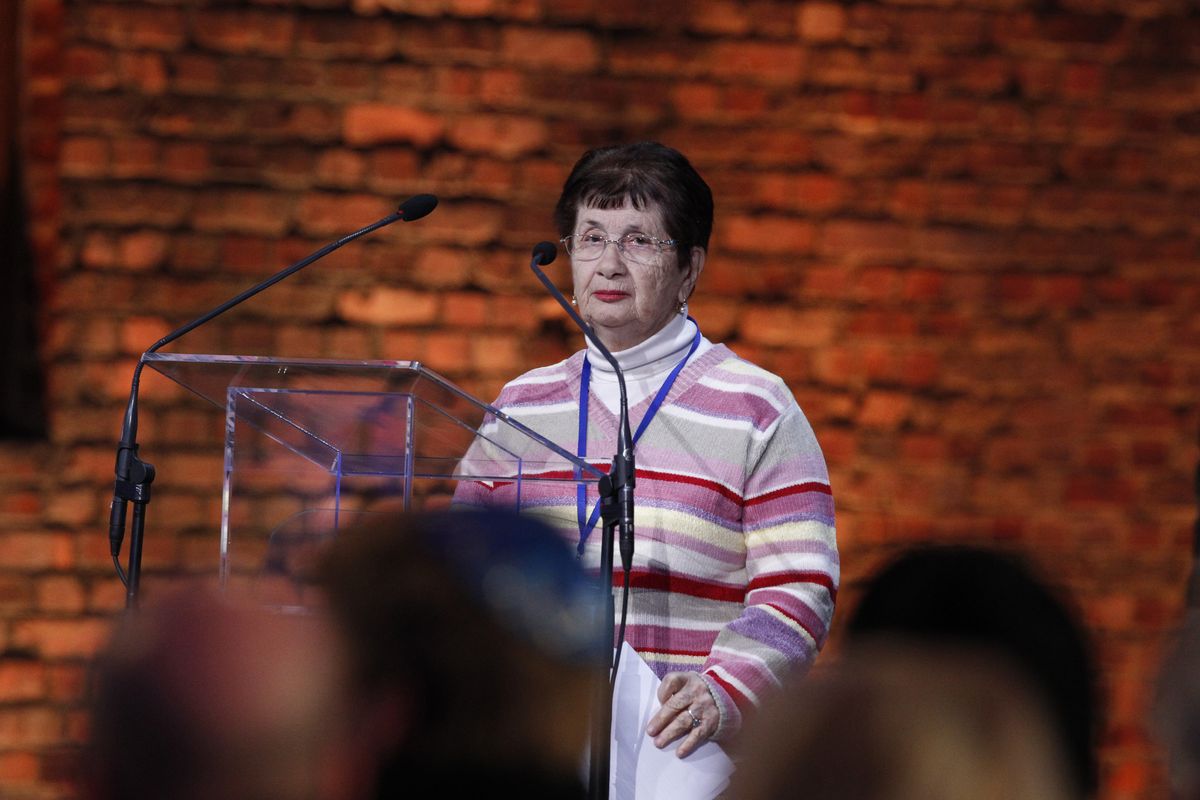 Polish born Holocaust survivor Halina Birenbaum speaks in a tent raised at the entrance of the Birkenau Nazi death camp in Oswiecim, Poland, Tuesday, Jan. 27, 2015, during the official remembrance ceremony. About 300 survivors gathered with leaders from around the world to remember the 1.1 million people killed at Auschwitz-Birkenau and the millions of others killed in the Holocaust. (Czarek Sokolowski / Associated Press)