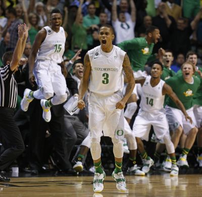 Joseph Young celebrates his game-winning 3-pointer. (Associated Press)
