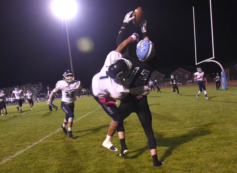 Gonzaga Prep defender Armani Marsh (7) prevents Central Valley's Christian Williams, right, from bringing in the endzone pass in the second half, Friday, Oct. 16, 2015, at Central Valley High School. (Jesse Tinsley / The Spokesman-Review)