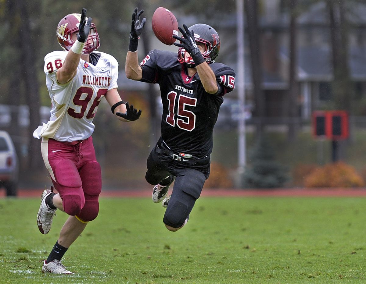 Pirates wide receiver Dale Entel hauls in a pass from Taylor Eglet against Reed Warner’s defense.  (Christopher Anderson)