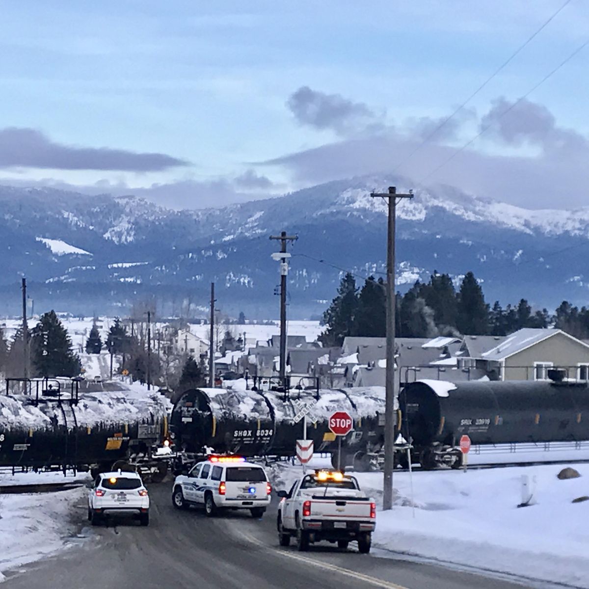 A teenage girl was killed Tuesday, Feb. 7, 2017 when the car she was in was struck by a train at Spokane Street in Post Falls. (Kathy Plonka / The Spokesman-Review)