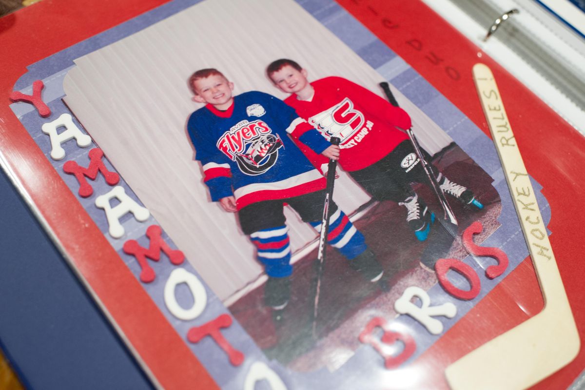 A photo of Keanu and Kailer Yamamoto from early days of hockey competition. (Tyler Tjomsland / The Spokesman-Review)