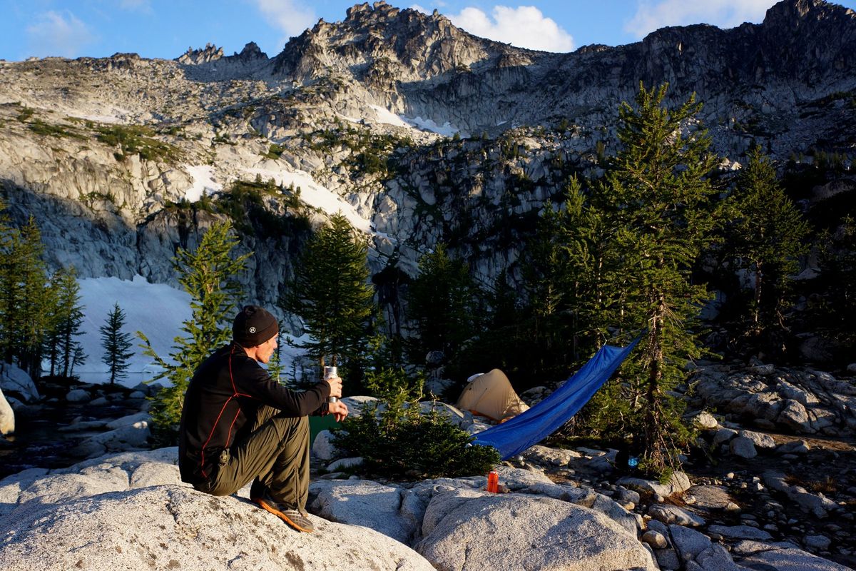 A participant in the 2013 backpacking school soaks in the views in the Enchantments region of the Washington Cascades.  (Courtesy of Chuck Huber)