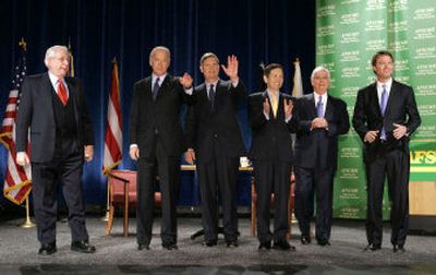 
Democratic presidential candidates, from left, former Alaska Sen. Mike Gravel, Delaware Sen. Joe Biden, former Iowa Gov. Tom Vilsack, Ohio Rep. Dennis Kucinich, Connecticut Sen. Christopher Dodd and former North Carolina Sen. John Edwards appear Wednesday     in Carson City, Nev.
 (Associated Press photos / The Spokesman-Review)