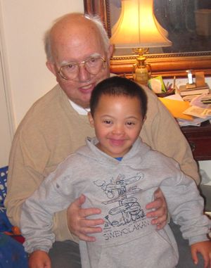 Harv Clark, pictured on Christmas Eve, 2010, with his grandson Kenner, died Friday after a long battle with heart disease. He was 69. Clark was a fixture on Spokane radio since the 1960s. (Courtesty of Erin Clark)