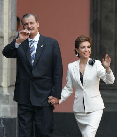 
Mexican first lady Marta Sahagun walks with her husband, President Vicente Fox, in  2004. 
 (Associated Press / The Spokesman-Review)