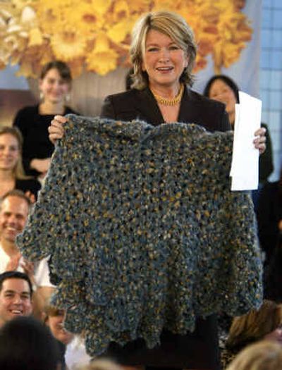 
Earlier this month Martha Stewart showed the poncho that a fellow inmate at Alderson crocheted for her. Since her release from prison, friends and co-workers say Stewart has a renewed sense of purpose.
 (File/Associated Press / The Spokesman-Review)