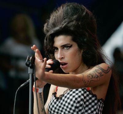 British singer Amy Winehouse performs at Lollapalooza at Grant Park in Chicago. (Associated Press)