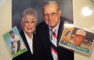 
Associated Press Baseball cards of major league player Bill Henry are shown next to an undated photograph of a man with the same name, Bill Henry, and his wife Elizabeth.
 (Associated Press / The Spokesman-Review)