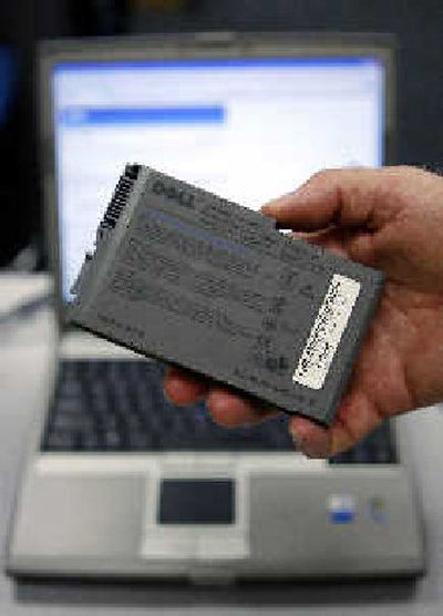 
Fire hazard: a recalled Dell notebook computer battery. 
 (Associated Press / The Spokesman-Review)