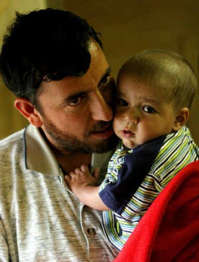
Hakim Gul Wardak and his son Qudratullah are seen after a press conference Wednesday at Phoenix U.S. base in the outskirts of Kabul, Afghanistan.
 (Associated Press / The Spokesman-Review)