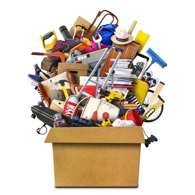 Large pile of household things in a box  (Shutterstock)