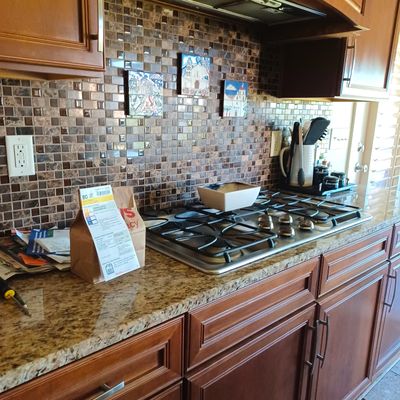 While it may seem complex, installing a ceramic tile kitchen backsplash is a prime DIY task.  (Tribune Content Agency)