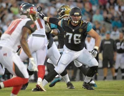 In this Aug. 20, 2016, file photo, Jacksonville Jaguars tackle Luke Joeckel (76) blocks against the Tampa Bay Buccaneers during an NFL preseason football game in Jacksonville, Fla. Joeckel, now with Seattle, will see his former team this week with the Seahawks travelling to Jacksonville for a matchup that has major importance for both teams. (Phelan M. Ebenhack / Associated Press)