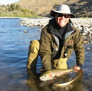 Greg Knab of Winthrop with a steelhead form the Methow River caught Sept. 28, 2011.
 (Darrell & Dad's Family Guide Service)