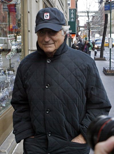 Bernard Madoff, chairman of Madoff Investment Securities, returns to his Manhattan apartment after making a court appearance Wednesday in New York.  (Associated Press / The Spokesman-Review)
