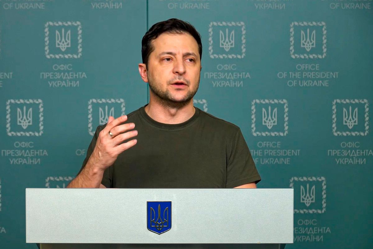 FILE – In this photo, Feb. 27, 2022, taken from video provided by the Ukrainian Presidential Press Office, Ukrainian President Volodymyr Zelenskyy speaks to the nation in Kyiv, Ukraine. Russian state media is spreading false claims that Ukrainian President Volodymyr Zelenskyy has fled Kyiv in what experts say is an effort to discourage Ukrainians and erode support for Ukraine around the globe.  (HOGP)