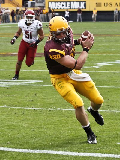Arizona State's Chris Coyle, right, makes a touchdown catch as he beats Washington State's Justin Sagote (51) during the first half of an NCAA college football game Saturday, Nov. 17, 2012, in Tempe, Ariz. Arizona State defeated the Washington State 46-7. (Ross Franklin)