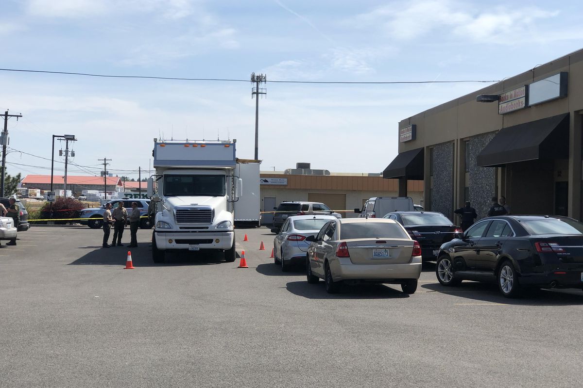 A suspect was shot and killed Friday morning after sheriff’s deputies responded to reports of gunfire at a business park in Spokane Valley. (Colin Mulvany / The Spokesman-Review)