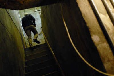 Aquatics Recreation Supervisor Carl Strong leaves the basement Monday at Comstock Pool, where deteriorating pipes are in need of an overhaul.
(Brian Plonka / The Spokesman-Review)