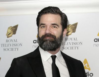 In this March 21, 2017, file photo, Rob Delaney poses for photographers upon arrival at the Royal Television Society Programme Awards in London. Delaney has announced the death of his infant son, Henry, from cancer, memorializing the boy as smart, funny, and mischievous in a Facebook post. (Tim Ireland / Associated Press)