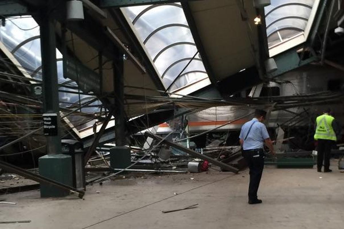 This Thursday, Sept. 29, 2016 photo provided by a passenger who was on the train when it crashed shows wreckage at the Hoboken, N.J. rail station. The commuter train barreled into the station during the morning rush hour, coming to a halt in a covered area between the station’s indoor waiting area and the platform. (Associated Press)