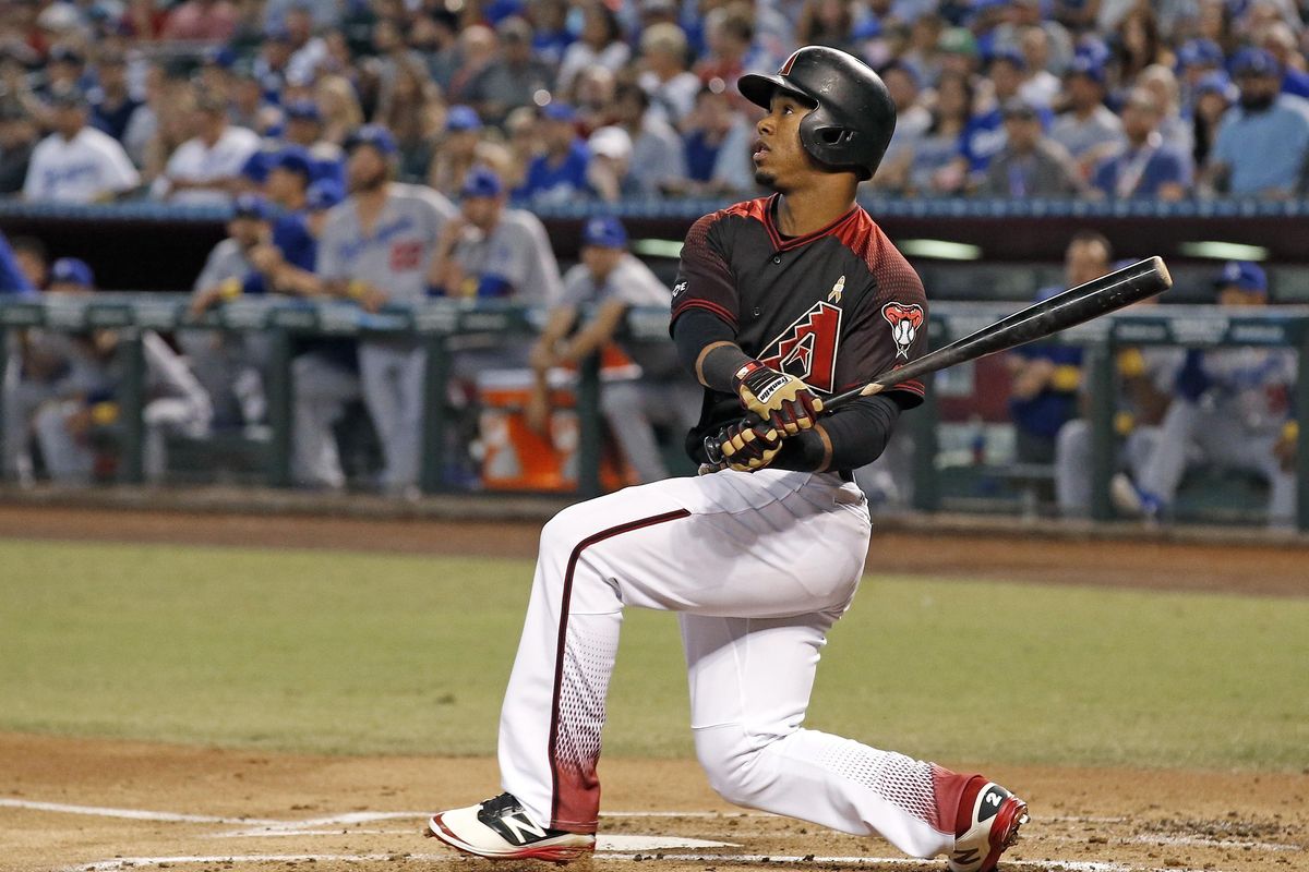 Arizona Diamondbacks’ Jean Segura watches the flight of his home run against the Los Angeles Dodgers during the first inning of a baseball game Saturday, Sept. 17, 2016, in Phoenix. (Ross D. Franklin / Associated Press)