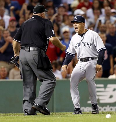 Yankees manager Joe Girardi yells at umpire Brian O'Nora after Alex Rodriguez was hit by a pitch. (Associated Press)