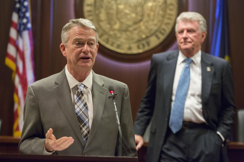 Idaho Lt. Gov. Brad Little, left, discusses health care reform on Friday, Jan. 5, 2018, at the AP Legislative Preview at the Idaho state Capitol in Boise; at right is Gov. Butch Otter. Little and Otter signed an executive order on Friday allowing new, lower-cost health insurance plans to be sold in the state. (Otto Kitsinger / AP)