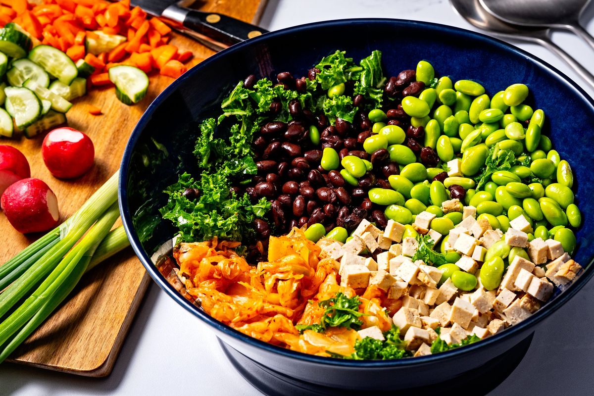 Kimchi and Kale Dense Bean Salad features beans, edamame and tofu for plenty of protein.  (Scott Suchman for The Washington Post/food styling by Lisa Cherkasky for The Washington Post)