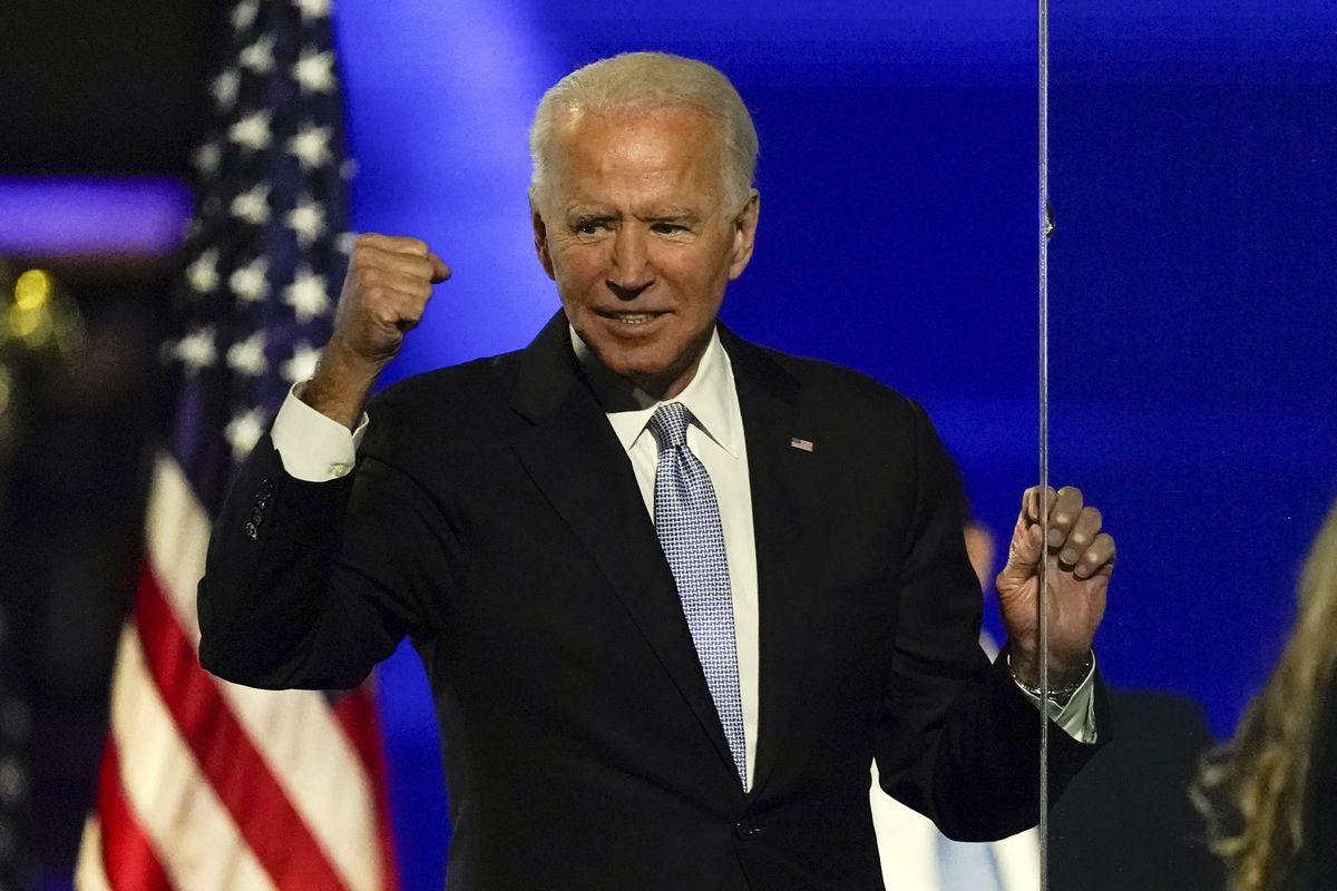 President-elect Joe Biden gestures to supporters Saturday, Nov. 7, 2020, in Wilmington, Del.  (Andrew Harnik)