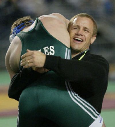 
Lakeside head wrestling coach Scott Jones carries Reid Chivers after win.
 (Patrick HagertySpecial to Spokesman-Review / The Spokesman-Review)