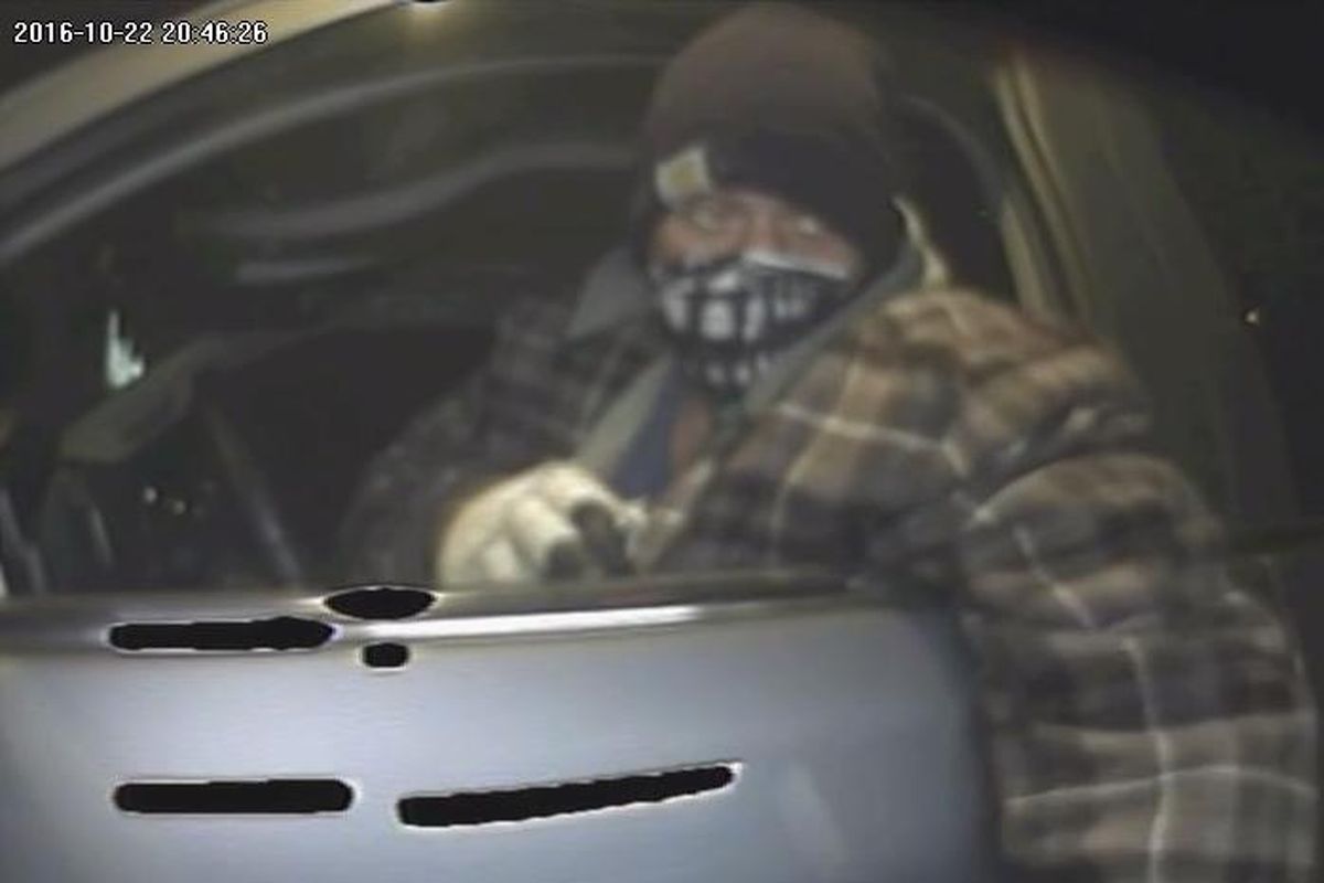 Police released this image of a person driving William “Bo” Kirk’s pickup truck at a bankcda branch in Hayden Saturday night, about an hour before the truck was found on fire north of there in the 23000 block of N. Rimrock Road. (Post Falls Police Department)