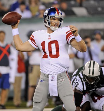 Eli Manning needed 12 stitches to close a cut suffered against the New York Jets.  (Associated Press)
