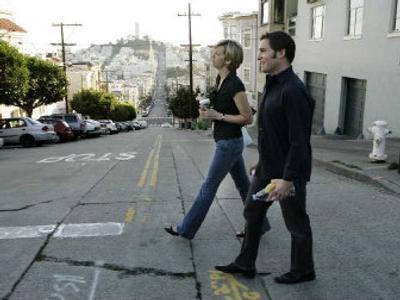 
Kristin Zimmerman, left, walks the Russian Hill district of San Francisco with her boyfriend Dave Raskin. Apartment demand and rents are soaring nationwide as the economy produces good jobs and people who might have bought homes a year ago settle for apartments while they wait for housing prices to tumble. 
 (Associated Press / The Spokesman-Review)