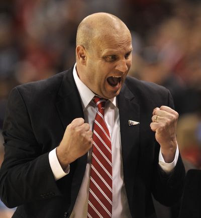 Gonzaga coach Kelly Graves pumps up his team during the second half of their second-round NCAA tournament women's college basketball game on Monday, March 21, 2011, in Spokane, Wash. (Colin Mulvany / The Spokesman-Review)
