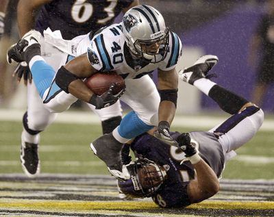 Running back Josh Vaughan and the Panthers fell 17-12 to the Ravens in their preseason opener.  (Associated Press)