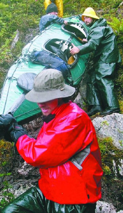 
Everybody in the group chips in to portage boats on a sea-kayaking and mountaineering expedition in the Patagonia region of southern Chile in 2006 during an 80-day course with the National Outdoor Leadership School (NOLS). 
 (Photo courtesy of Peter Stevenson / The Spokesman-Review)
