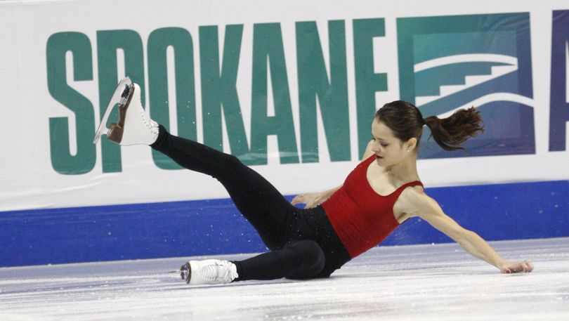 Sasha Cohen falls as she skates during a practice at the U.S. Figure Skating Championships in Spokane, Wash., Wednesday, Jan. 20, 2010. (Rick Bowmer / Associated Press)