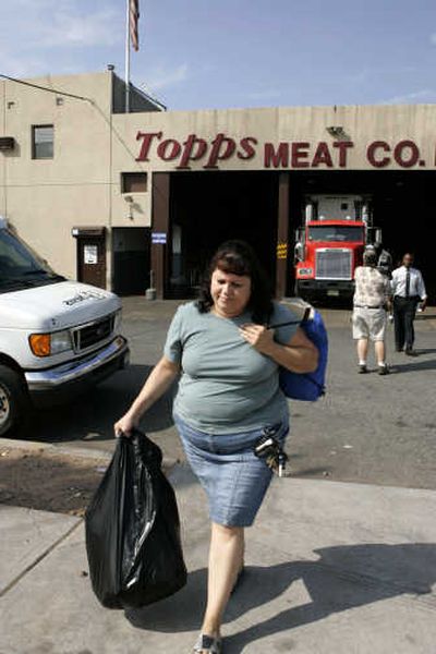 
Vivian Quinones, a two-year employee, leaves the Topps Meat Co. plant in Elizabeth, N.J., on Friday. Associated Press
 (Associated Press / The Spokesman-Review)