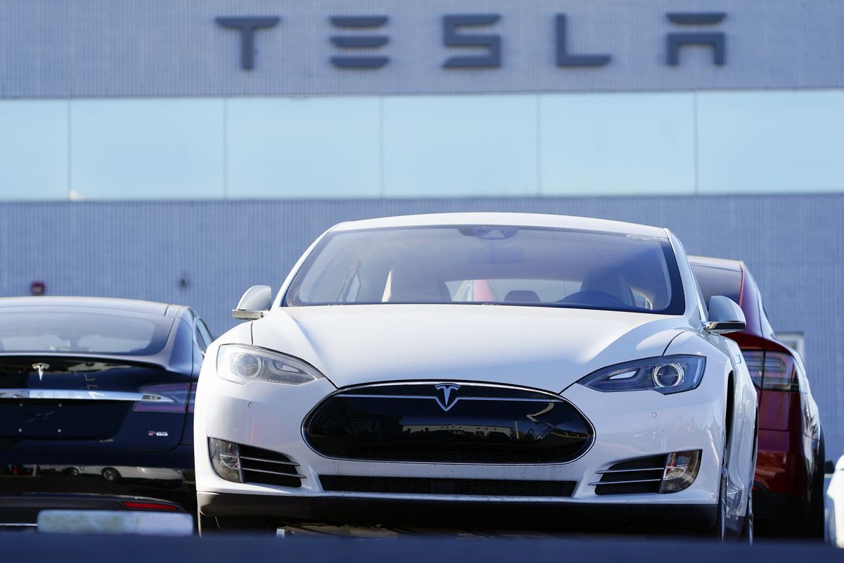 This photo from Nov. 8, 2020, shows an unsold 2021 S70 sedan sits at a Tesla dealership in Littleton, Colo. Tesla stock tumbled Monday, its first day in the S&P 500.   (Associated Press)