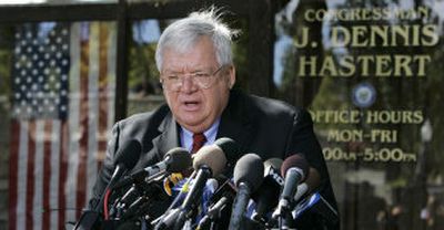
House Speaker Dennis Hastert speaks during a news conference outside his Bativia, Ill., office Thursday. Hastert held his ground against pressure to resign. 
 (Associated Press / The Spokesman-Review)