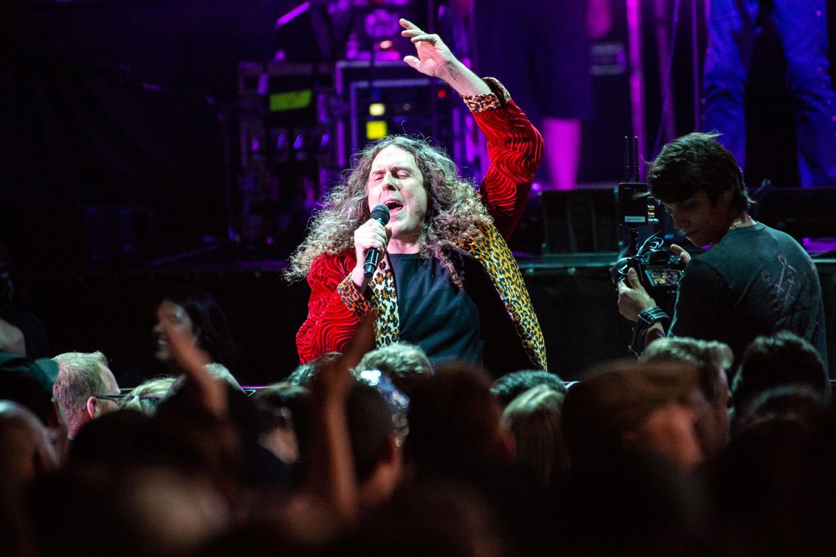 Parody singer-songwriter and comedian "Weird Al" Yankovic performs in the crowd at Northern Quest Casino on Sunday, Aug. 18, 2019. Yankovic brought his signature brand of wacky fun with many costumes, a 41-piece orchestra and more on his "Strings Attached" tour. (Libby Kamrowski / The Spokesman-Review)