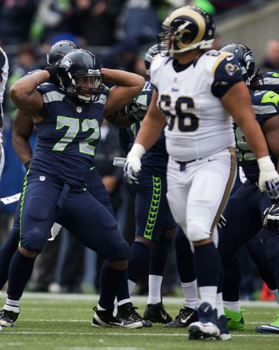 Some look away when Seattle DE Michael Bennett (72) starts rotating his 274-pound body. Others are unable to look away.