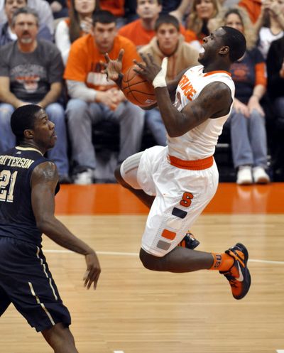 Syracuse’s Dion Waiters, right, had 16 points against Pittsburgh. (Associated Press)