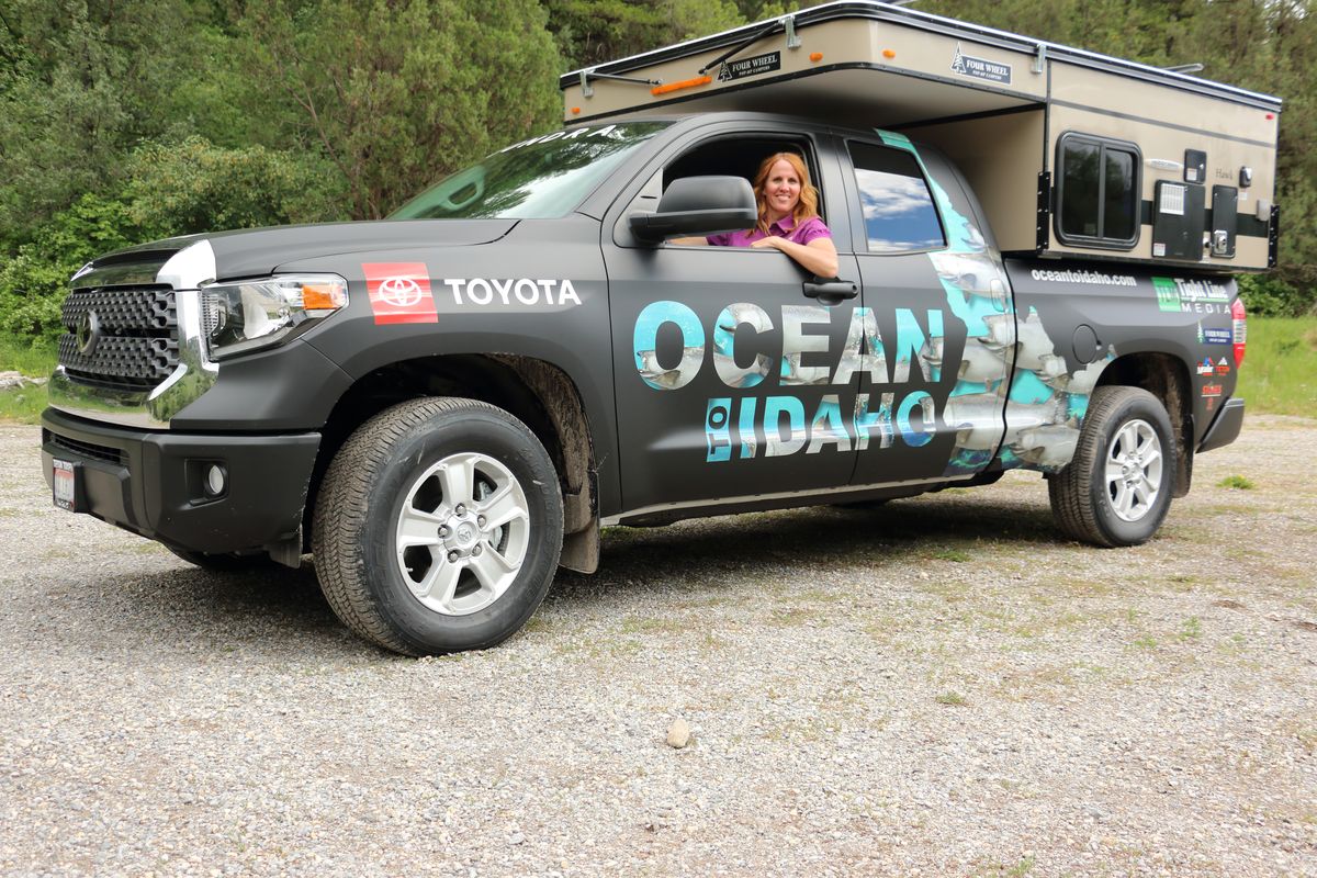 Filmmaker and journalist Kris Milgate hangs out in her Toyota Tundra during the production of “Ocean to Idaho.” Her truck/camper rig has allowed her to have self-contained transport and lodging in one while she is on the road, allowing her to minimize interactions with others.  (Tight Line Media/courtesy)