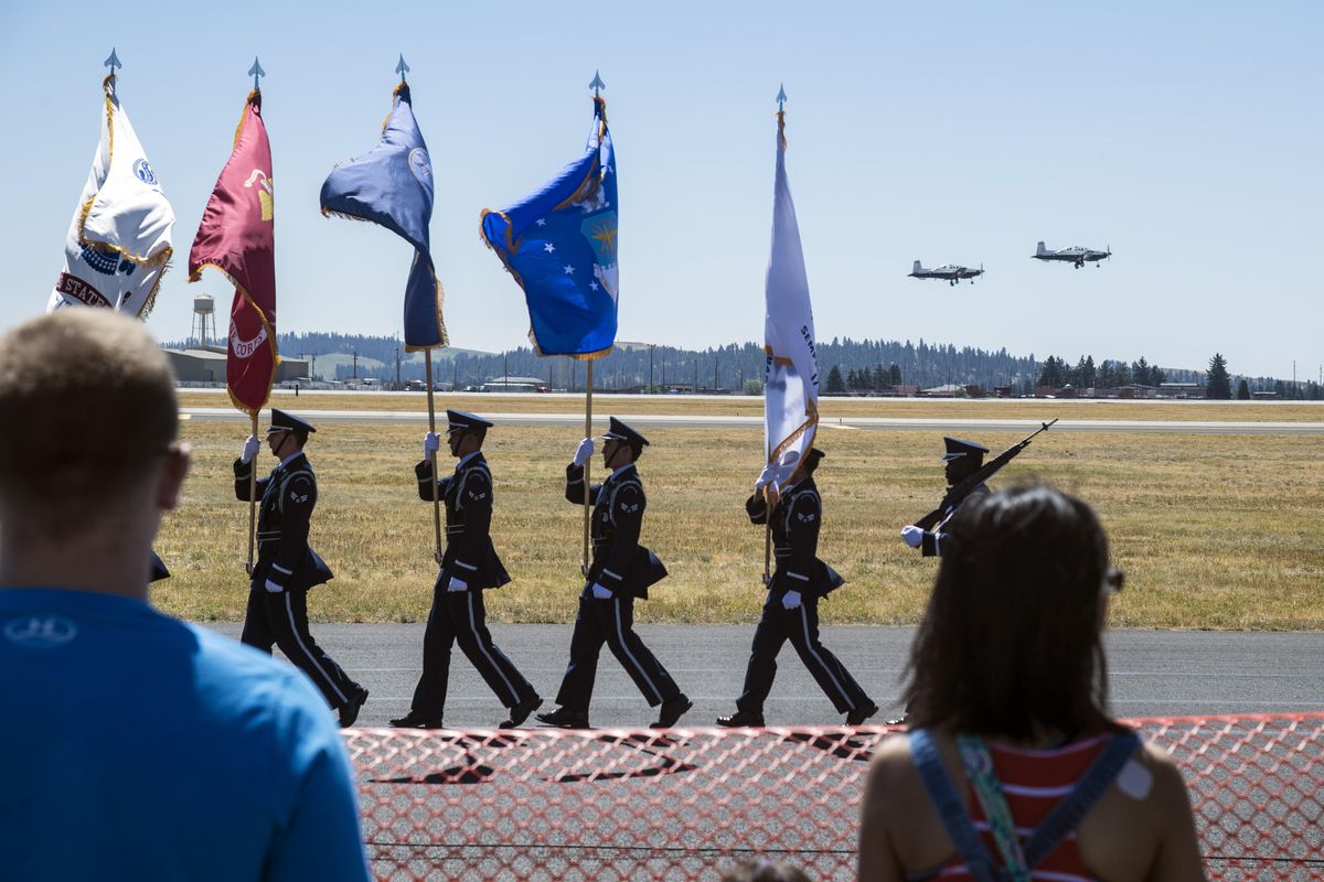 The Fairchild Color Guard take its positions for the opening of Skyfest, July 29, 2017. (Dan Pelle / The Spokesman-Review)